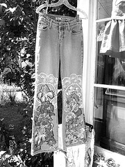 Woodstock.  NY state.  USA.   July 22th 2008.- Mudd flowery jeans. B & W.