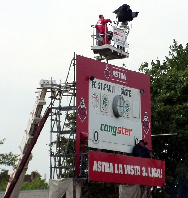Scoreboard with TV-team on crane
