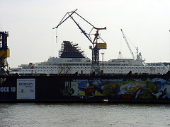 Crane, graffiti and little yacht