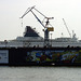 Crane, graffiti and little yacht