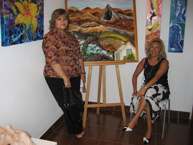 Espaço AmArte, painter Micéu (left) exhibition with Maria da Nazaré, gallery director