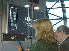 Mature blonde in high heeled Cowgirl boots -  Brussels airport - October 19th 2008