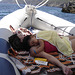 Rafaela & mother sleeping on the sea surf