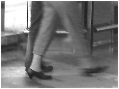 Mature in sexy nun shoes  / Dame mature en chaussures de religieuses sexy -  Aéroport de Bruxelles / 19 octobre 2008 - B & W.