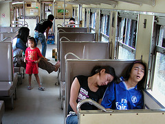 Passenger in a regional train, Thailand