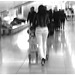Noire très sexy en talons hauts aiguilles - Black Lady in tight pale pant and high heels -  Aéroport de Bruxelles .  - Blurry sight in b & w /   Vision trouble en noir et blanc
