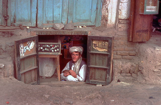 Watch vendor in his small shop