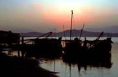 Fishing boats in sunset on the Irrawaddy, Burma