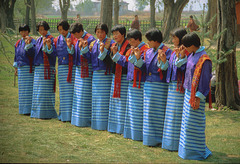 Dancing women in their traditional Kira