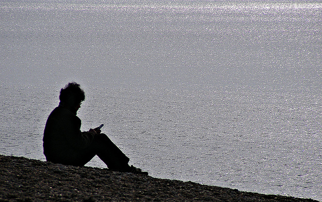 Texting by the sea