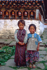 Bhutanese little ladies in the yard of the monastery