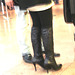 Bottes de Dominatrice sur plancher de tuiles luisantes - Dominatrix Boots on gleaming tiles flloor-  Aéroport de Bruxelles - Brussels airport - 19-10-2008 -  Photofiltrée