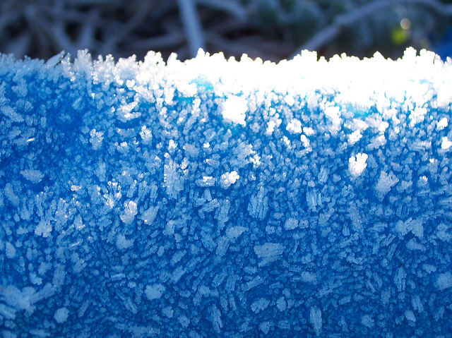 Hoar frost on a tarpaulin looks brilliant in the sun