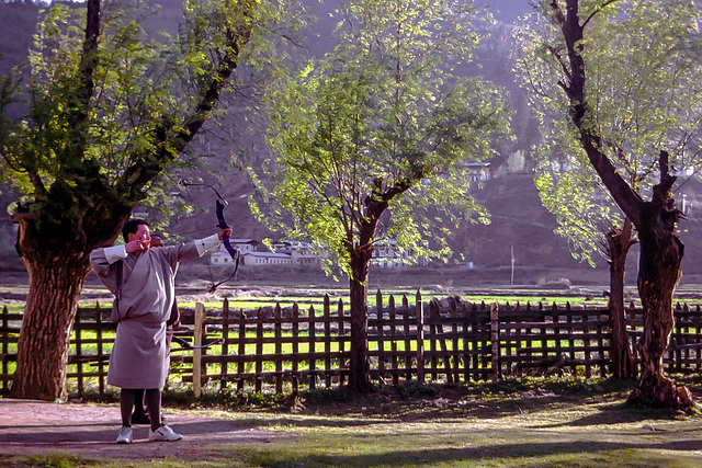 Bhutanese man playing archery