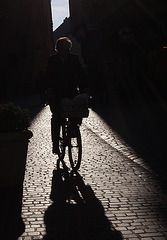 dark cyclist