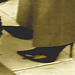 Dame blonde du bel âge en bottes de Dominatrice avec son toutou - Blonde mature in Dominatrix Boots with her dog- 19-10-2008 -  Aéroport de Bruxelles .  SEPIA avec photofiltre.