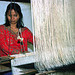 My wife is weaving Laotian garment