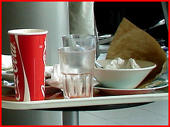 Coca-cola and water leftovers / Plateau collation à la Coca-cola - Schiphol airport.