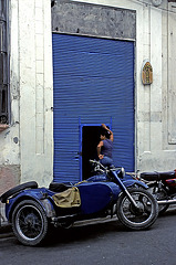 Blue Door-Woman-Motorcycle