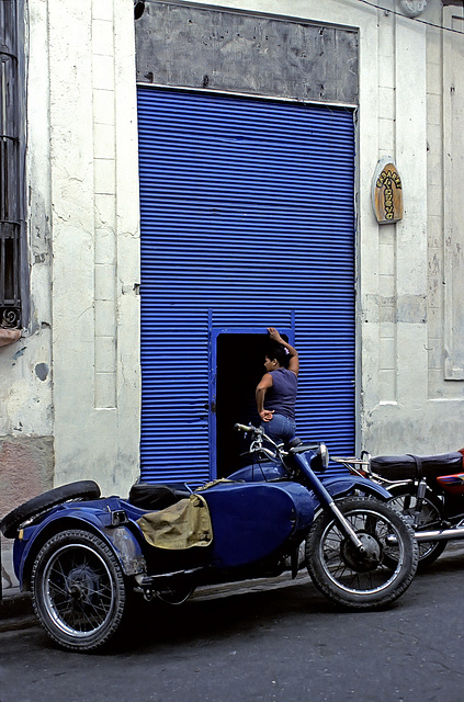 Blue Door-Woman-Motorcycle