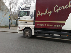 Flower delivery truck with interesting sign