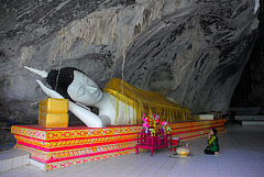 Lying Buddha at the entrance to the cave