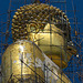 Cleaning and repairing the big image of Lord Buddha