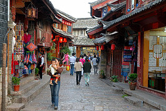 Streets, bridge, wooden houses and red lanterns
