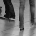 Short & cute Lady on flats & booted blond in jeans-  Brussels airport -19-10-2008- B & W