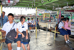 School pupils cross the Chao Phraya