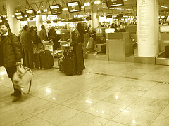 Meryl Streep's style Star Alliance blond mature in Dominatrix Boots - Brussels airport  / 19-10-2008 - Sepia