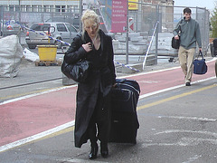 Meryl Streep's style Star Alliance blond mature in Dominatrix Boots - Brussels airport  / 19-10-2008