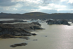 The Skeiðará river flows into a glacial lake