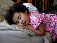 Rafaela, the Sleeping Beauty on the armchair's arm