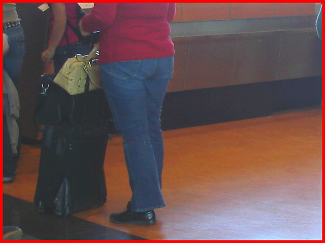 Chubby blond in red and jeans on flats - Blonde mature en souliers plats - PET Montreal airport.