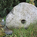 Grabplatte mit so genanntem "Seelenloch" / Grave with prehistorical holed stone