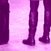 Blond in flat boots and checked skirt /  Blonde en bottes SS et jupe en damiers- Aéroport de Montréal. - Photofiltrée en violet.