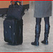 Blond in flat boots and checked skirt /  Blonde en bottes SS et jupe en damiers- Aéroport de Montréal.
