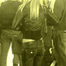 Young sexy blond in Bossy Boots with a gorgeous bum in jeans- PET Montreal airport- Photofiltrée à l'ancienne.