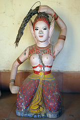 A figure inside the temple complex