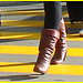 High heeled Boots and tights on yellow lines -  Bottes à talons hauts et collants sur lignes jaunes- Aéroport de Montréal. 18/10/2008