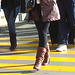 High heeled Boots and tights on yellow lines -  Bottes à talons hauts et collants sur lignes jaunes- Aéroport de Montréal.