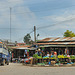 Phou Khoun and a market on the traffic refuge
