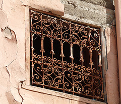 Rusty Wrought Iron Window