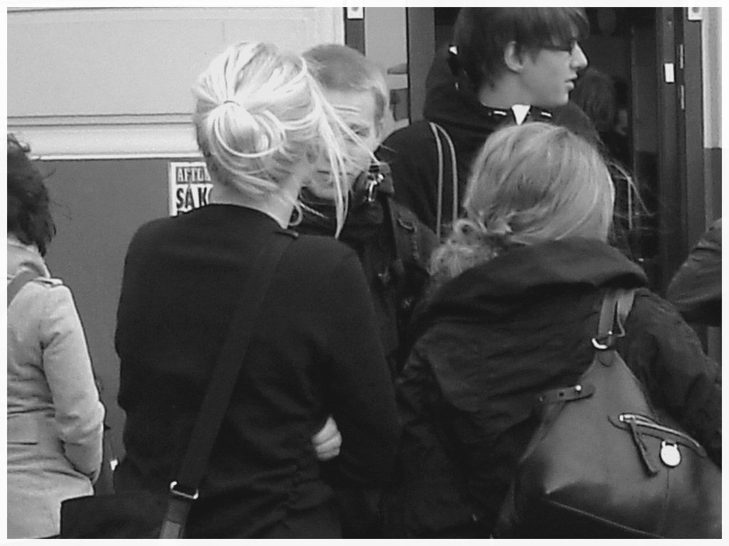7 Eleven Swedish blonde duo in dominatrix and flat leather Boots - Helsingborg / Sweden.  October 22th 2008.- B & W