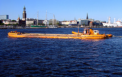Barge in front of Hamburg-Skyline