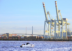 Cranes with boat and Köhlbrandbridge