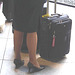 Blond flight attendant smoker in high heels shoes - Copenhagen train station airport  /  October 20th 2008