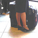 Blond flight attendant smoker in high heels shoes - Copenhagen train station airport  /  October 20th 2008