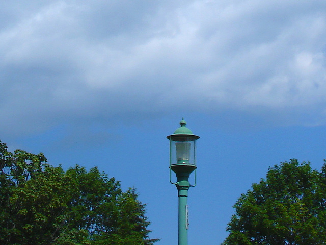 Lampadaire avec ciel et arbres  /   Street lamp with sky and trees.   Hometown  / Dans ma ville.  15 juillet 2009